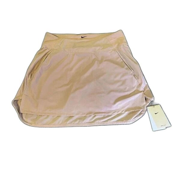 Nike Dresses & Skirts - NWT Nike Dri-FIT Bliss Mid-Rise Training Skort Pink